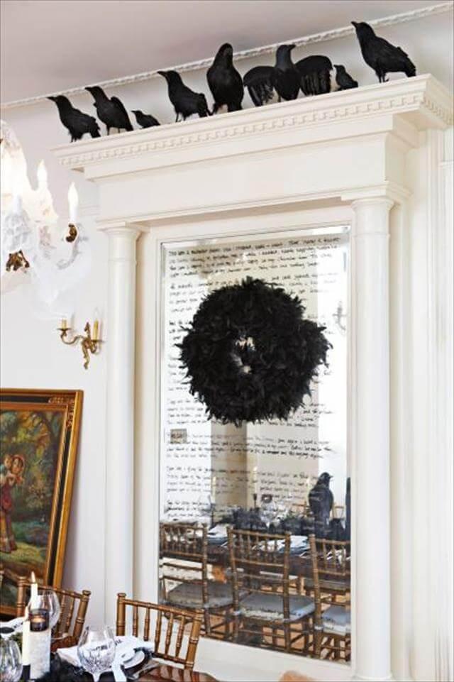 Mirror With Crow And Wreath Design Idea