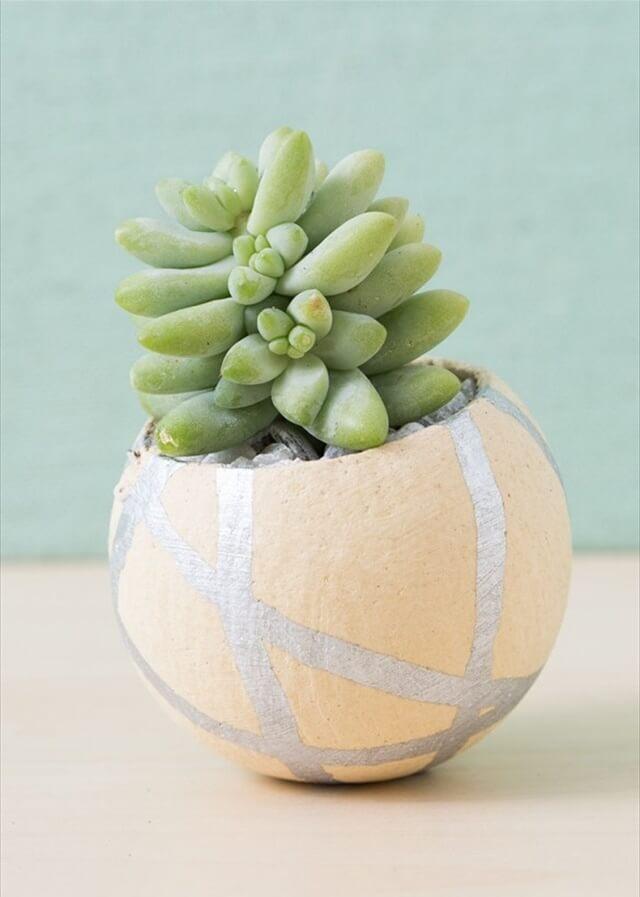 A silver paint pen makes this bell cup planter look so cute