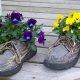 Recycling shoes for planters and backyard decorating with flowers