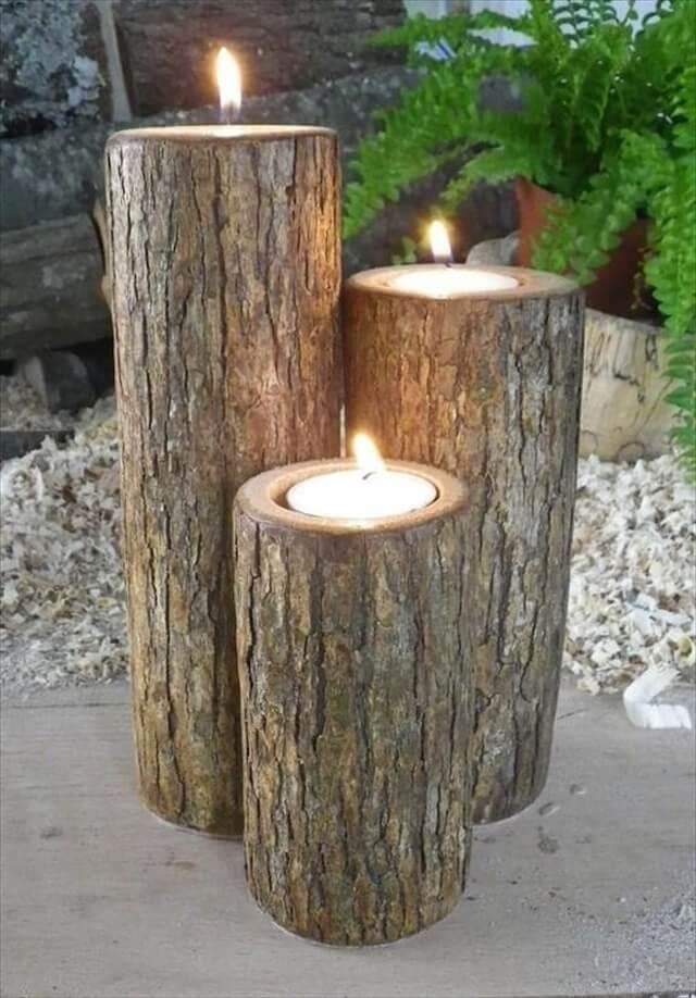 Homemade candles carved into wooden blocks 