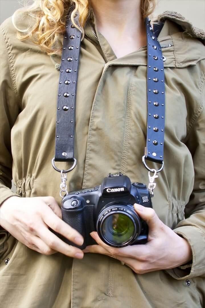 Convert an old belt into a camera strap.