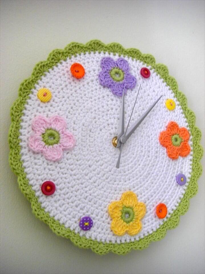 This crochet wall clock with flowers and buttons is the most creative thing