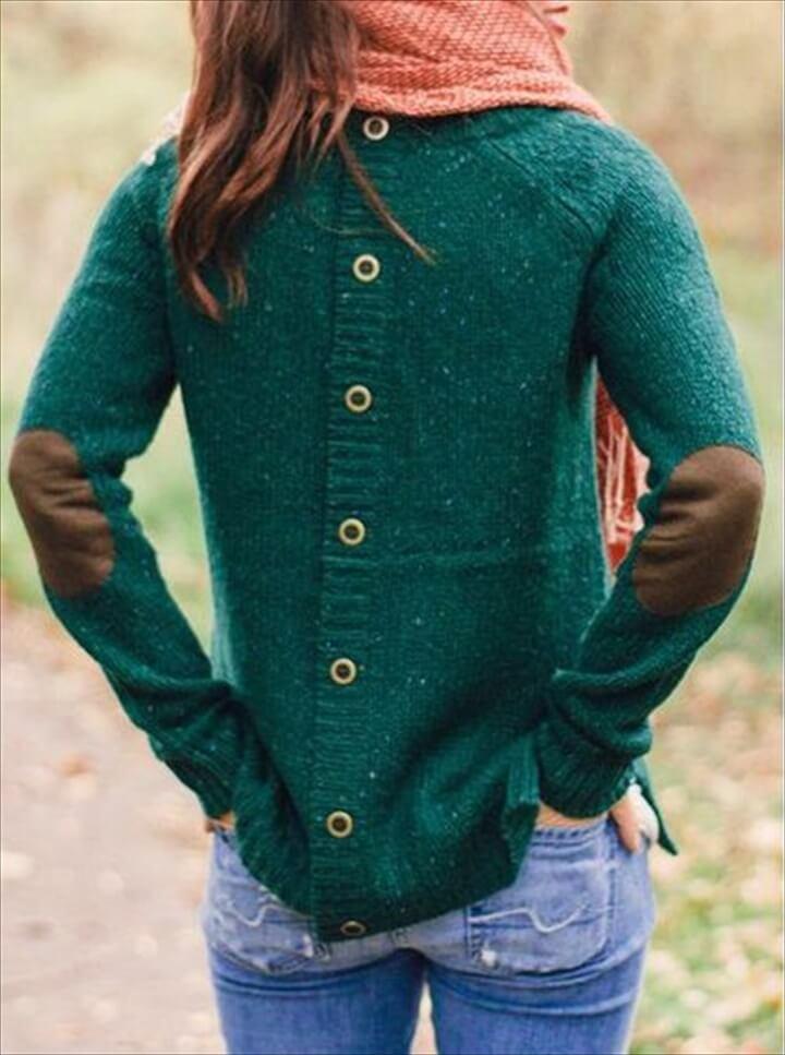 love the button detail at the back and elbow patches on this green sweater