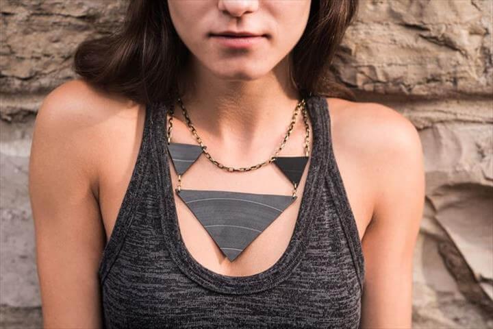 geometric necklace is hand crafted from old vinyl records. '