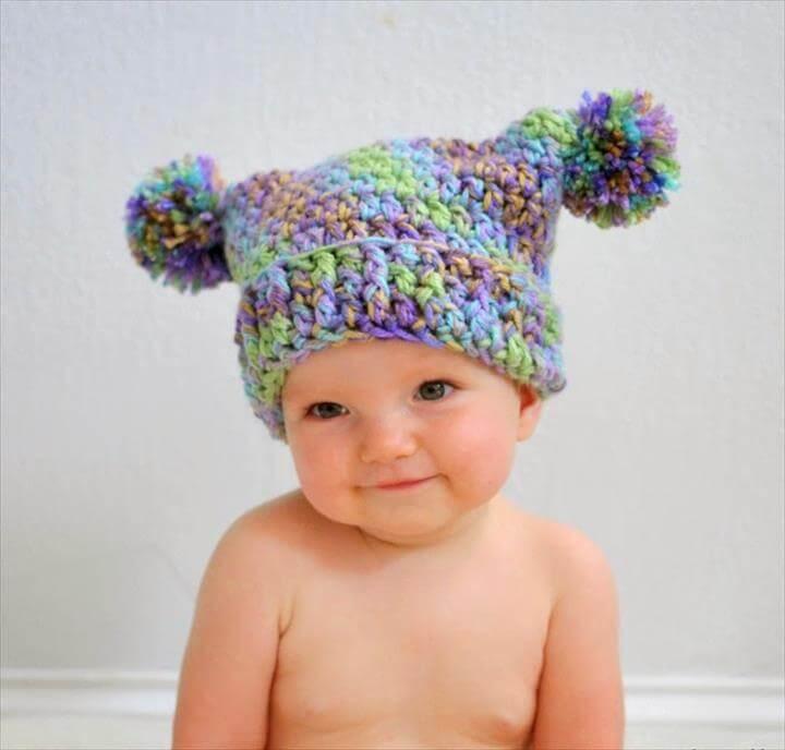 crochet pattern to make this adorable double pom pom hat!