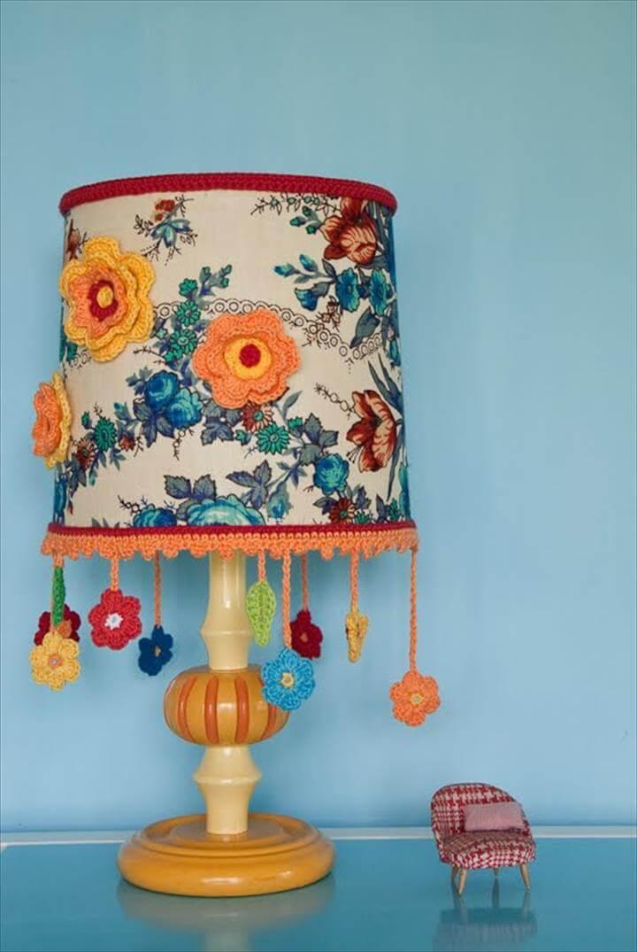 Anthropologie-Inspired Flower Lamp ShadeYour plain colored lamp shade will be brought to the next level when flowers are added on it.