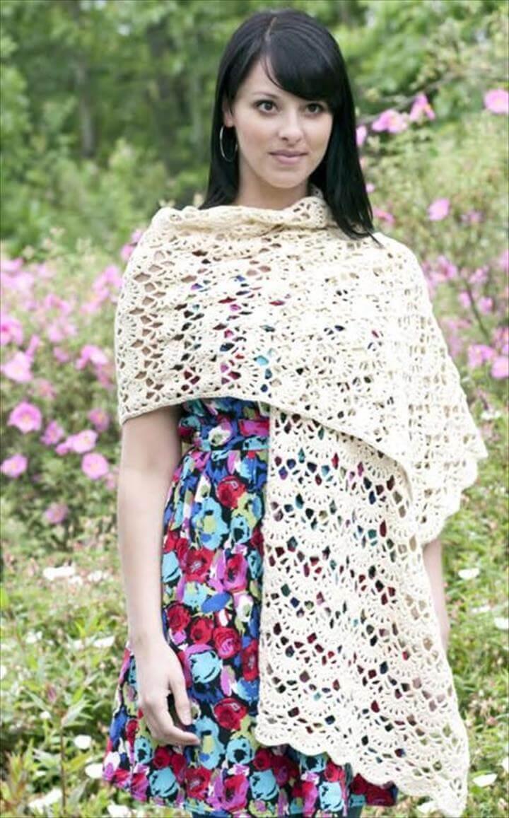 woman wearing a white crocheted shawl