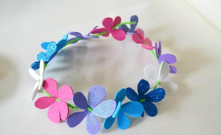 a floral crown from foam sheets, pipe cleaners and ribbon