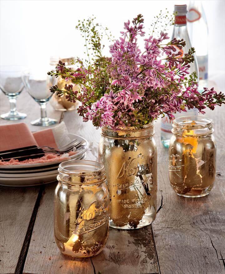 Upgrade your picnic table with gilded DIY vases and votives. Use a foam brush to