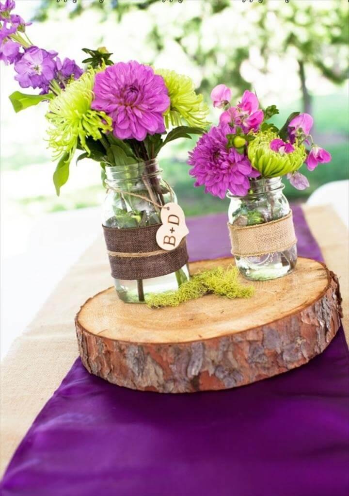 mason jar centerpieces purple, rustic purple wedding centerpiece idea, monogram mason jars, rustic