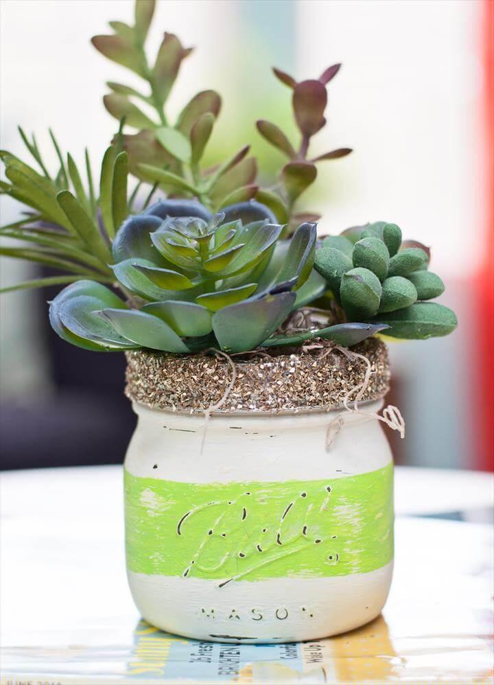 Use chalk paint and Mod Podge to create these gorgeous DIY mason jar succulent pots for