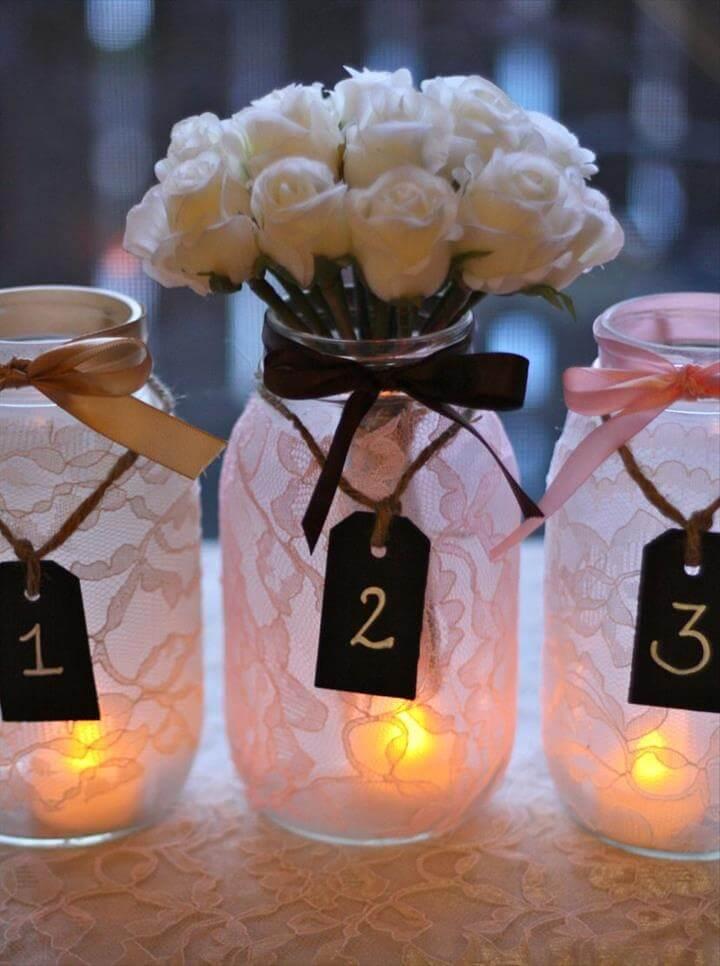 Wedding table decor with mason jar candle centerpieces