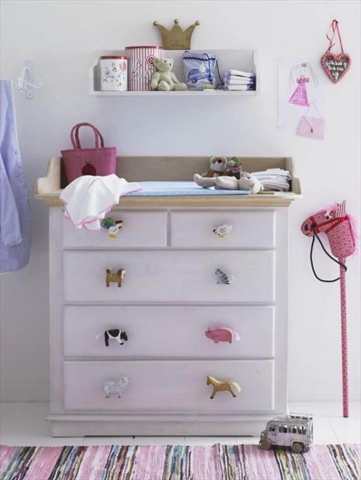 Wooden animal puzzle pieces as drawer handles for a kid's dresser