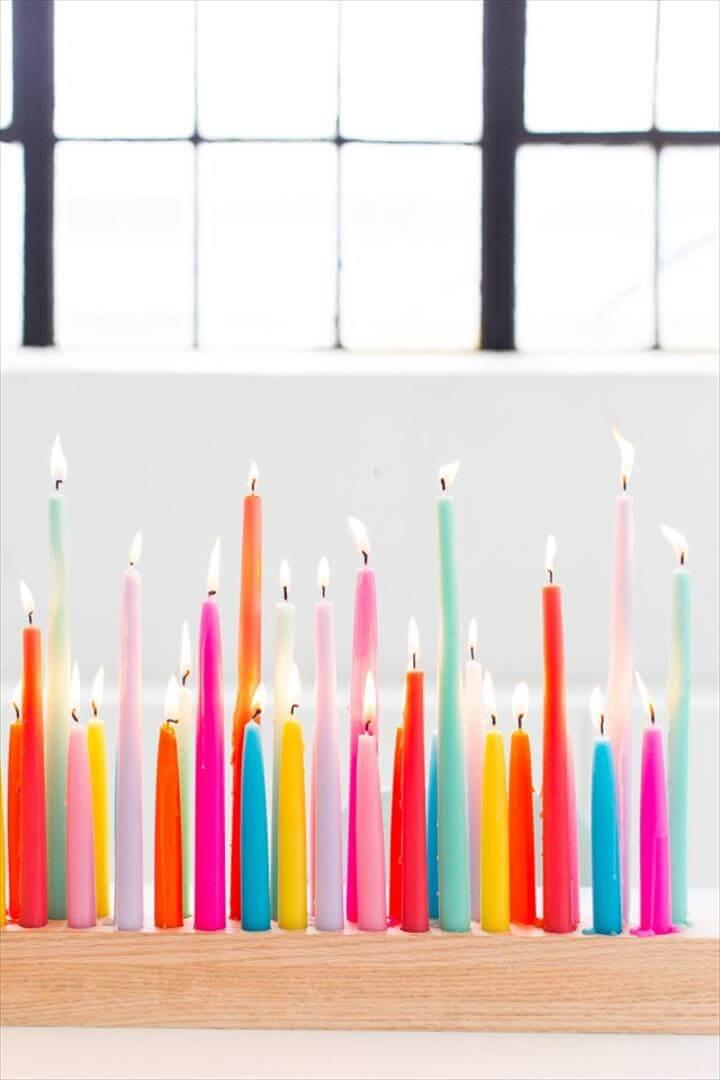 A perfectly colorful rainbow DIY taper candle holder for parties and entertaining