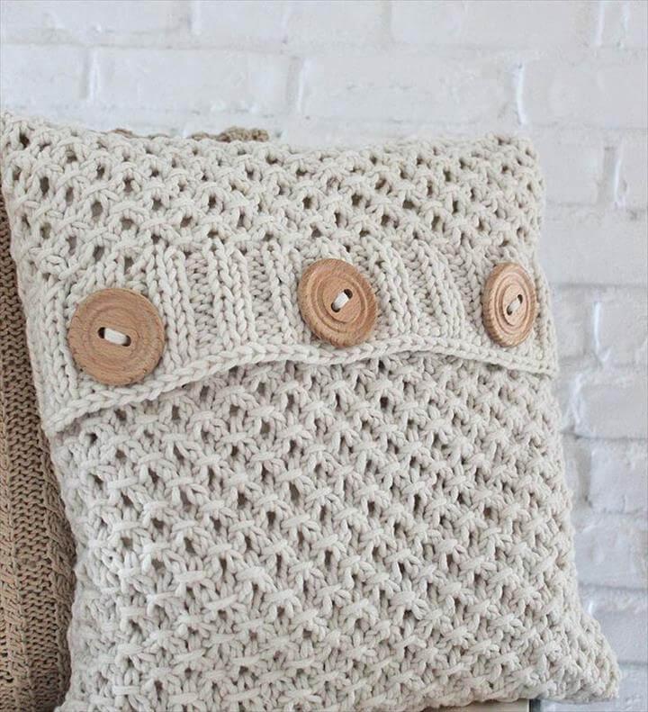Knit textured pattern pillow covers and great buttons .