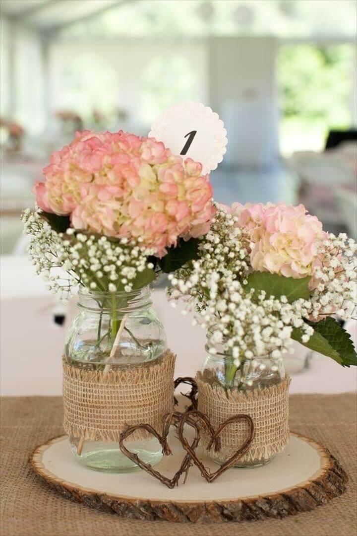 Centerpieces for our rustic country bridal shower. Mason jars .