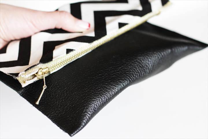 black and white leather clutch