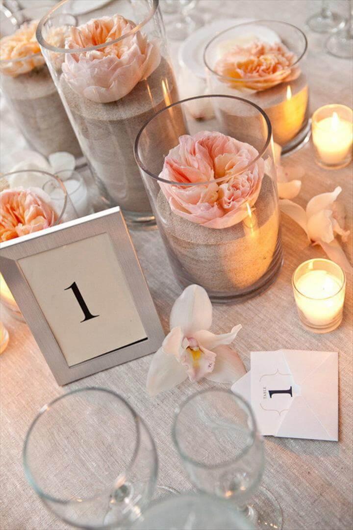 DIY wedding centerpieces with sand and peonies