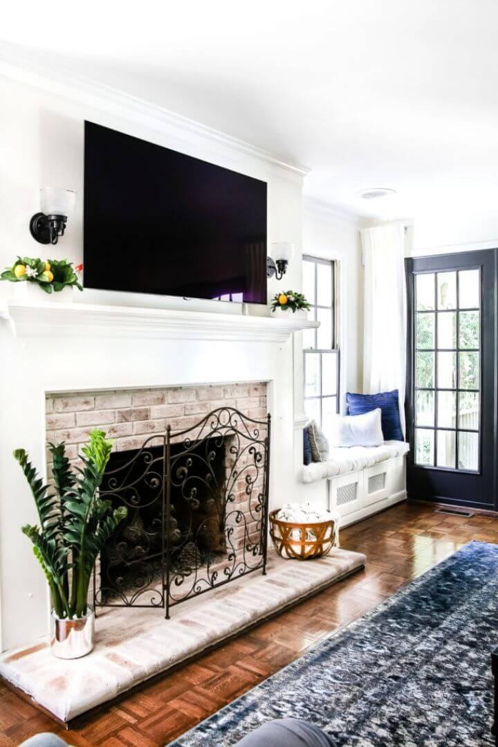 Create A DIY Lime Washed Brick Fireplace