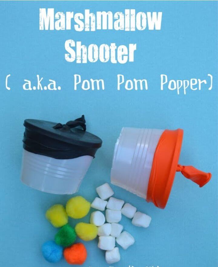 DIY Pom Pom Shooters from Come Together Kids