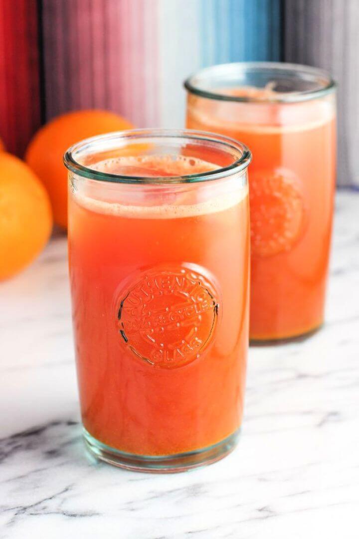 Make A DIY Watermelon Orange Ginger Turmeric Juice 4